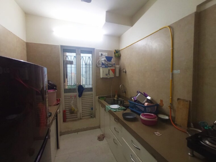 Kitchen, dosti-west-county-phase-4-dosti-pine 2 Bedroom 695 Sq.Ft. Apartment In Balkum Pada Thane 9305379