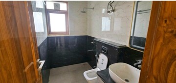Bathroom in 3 BHK Builder Floor at DLF Alameda Independent Floors, Sector 73 – for Sale