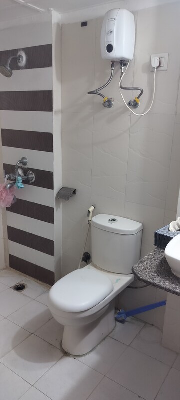 Bathroom in 3 BHK Apartment at Amrapali Eden Park, Sector 50 – for Rent