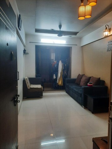Living Room in 1 BHK Apartment at Tulip Garden Seawoods, Seawoods – for Sale
