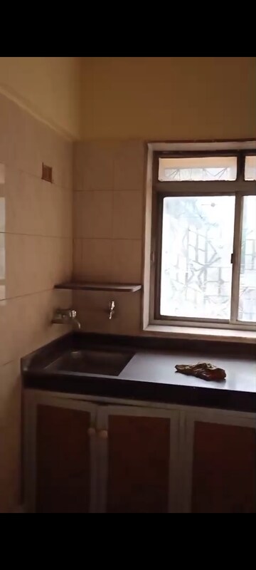 Kitchen in 1 BHK Apartment at Anamaya CHS, Andheri East – for Sale