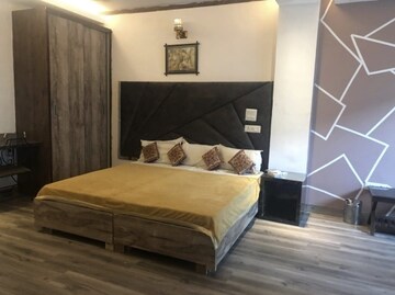 Bedroom in 3 BHK Builder Floor at Nehru Enclave – for Rent