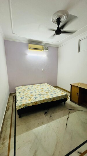 Bedroom in 2 BHK Builder Floor at Kalkaji – for Rent