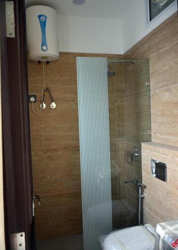 Bathroom in 3 BHK Builder Floor at Green Park Extension – for Rent