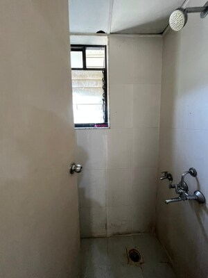 Bathroom in 1 BHK Apartment at Lodha Golden Dream, Dombivli East – for Rent