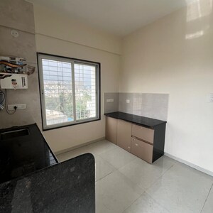 Kitchen in 1 BHK Apartment at Wadgaon Sheri – for Rent