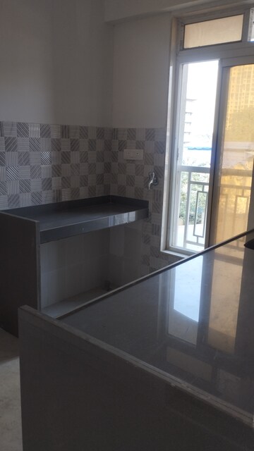 Kitchen in 2 BHK Apartment at ISD Maple Heights, Agripada – for Sale