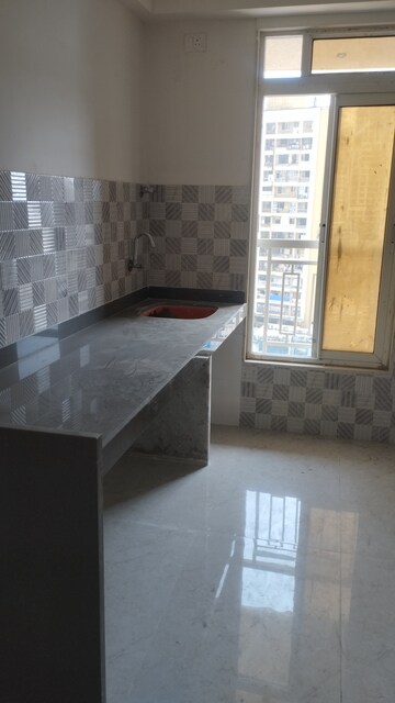 Kitchen in 1 BHK Apartment at ISD Maple Heights, Agripada – for Sale