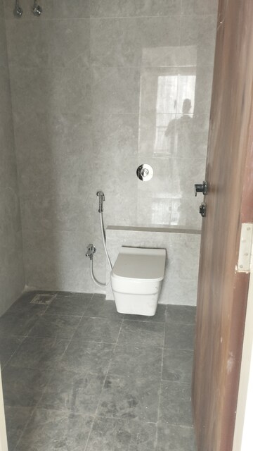 Bathroom in 1 BHK Apartment at ISD Maple Heights, Agripada – for Sale