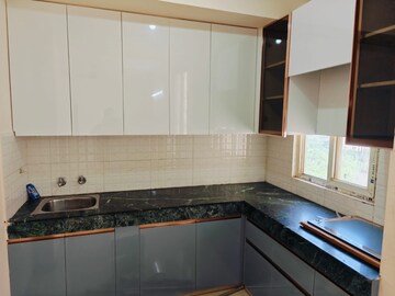 Kitchen in 2 BHK Apartment at Shree Vardhman Green Court, Sector 90 – for Rent