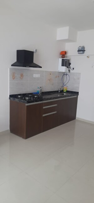 Kitchen in Studio Apartment at Gera World of Joy, Kharadi – for Rent
