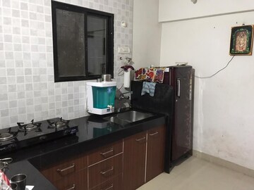 Kitchen in 2 BHK Apartment at Rahul Atul Nagar CHS, Warje – for Rent