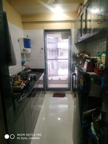 Kitchen in 2 BHK Apartment at Sk Imperial Heights, Mira Road – for Sale