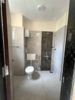 Bathroom in 2 BHK Apartment at Maurya CHS, Sangamvadi – for Rent