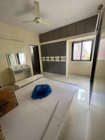 Bedroom in 2 BHK Apartment at Maurya CHS, Sangamvadi – for Rent