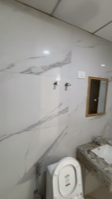 Bathroom in 2.5 BHK Builder Floor at Smart World Gems, Sector 89 – for Rent