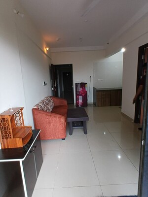 Living Room in 1 BHK Apartment at Duville Riverdale Suites, Kharadi – for Rent