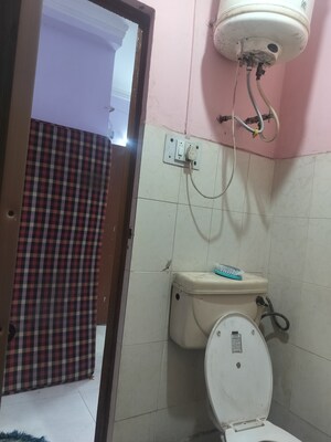 Bathroom in 2 BHK Apartment at Katwaria Sarai – for Rent