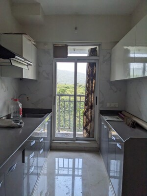 Kitchen in 1 BHK Apartment at Vihang Vermont, Ghodbunder Road – for Rent
