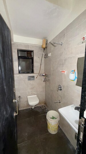 Bathroom in 2 BHK Apartment at Shiv Archana Apartment, Malad East – for Rent