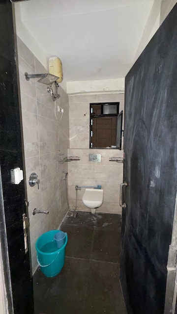 Bathroom in 2 BHK Apartment at Shiv Archana Apartment, Malad East – for Rent