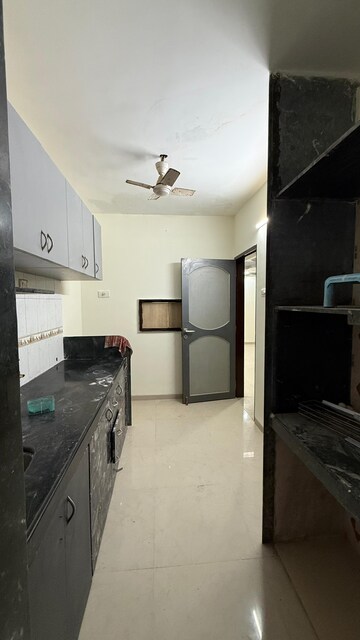 Kitchen in 2 BHK Apartment at Shiv Archana Apartment, Malad East – for Rent