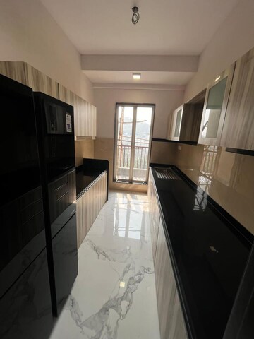 Kitchen in 4 BHK Apartment at NSG Chittaranjan Tower, Powai – for Sale