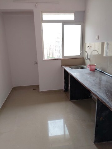 Kitchen in 1 BHK Apartment at Puraniks City Reserva, Ghodbunder Road – for Sale