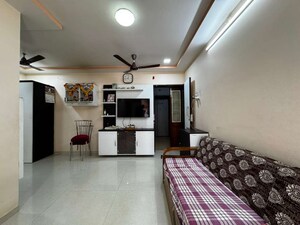 Living Room in 1 BHK Apartment at Kingston Tower, Vasai West – for Sale