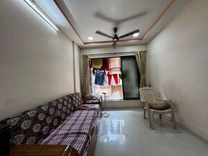 Living Room in 1 BHK Apartment at Kingston Tower, Vasai West – for Sale