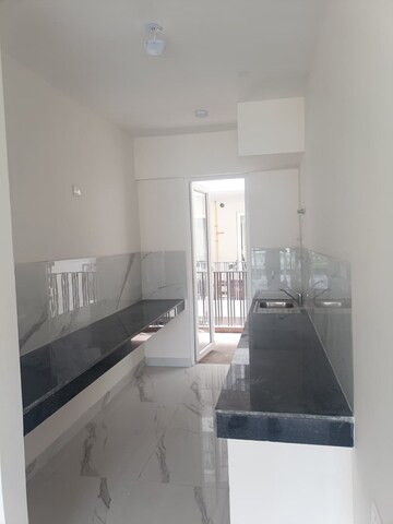 Kitchen in 3.5 BHK Apartment at Smart World Gems, Sector 89 – for Rent