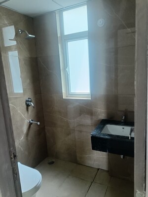 Bathroom in 3.5 BHK Apartment at Smart World Gems, Sector 89 – for Rent
