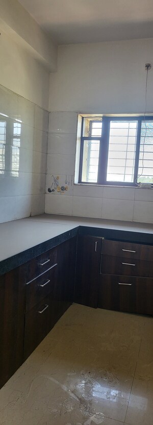 Kitchen in 3 BHK Apartment at Amli Industrial Estate – for Rent