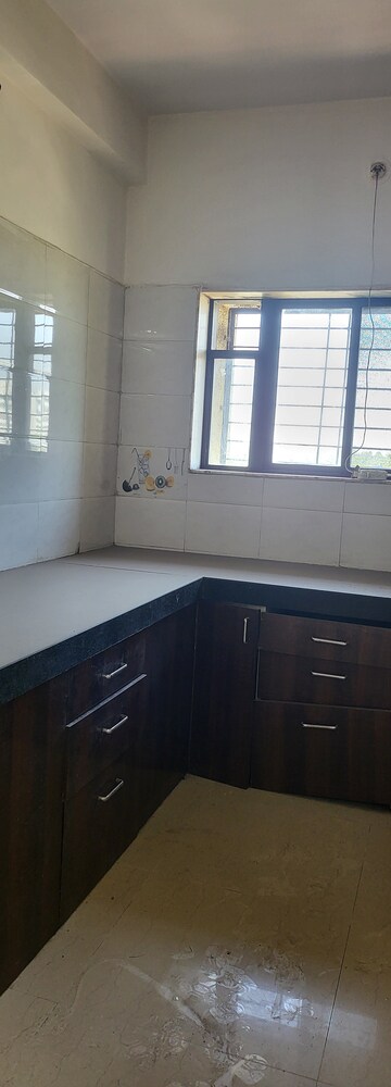 Kitchen in 3 BHK Apartment at Amli Industrial Estate – for Rent