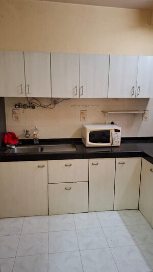 Kitchen in 1 BHK Apartment at Magnolia Enclave, Powai – for Rent