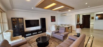 Living Room in 4 BHK Apartment at Juhu Scheme, Juhu – for Rent