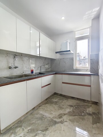 Kitchen in 3 BHK Apartment at Freedom Fighters Enclave – for Rent