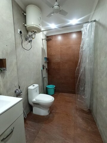 Bathroom in 3 BHK Apartment at Freedom Fighters Enclave – for Rent
