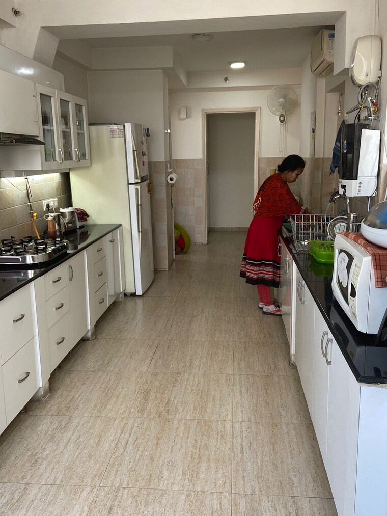 Kitchen, pioneer-park-presidia 4 Bedroom 4063 Sq.Ft. Apartment In Sector 62 Gurgaon 9306802