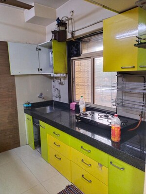 Kitchen in 2 BHK Apartment at Bhoomi Acres, Thane West – for Rent