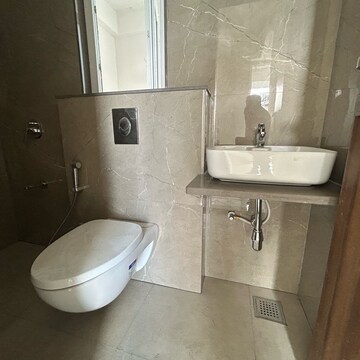 Bathroom in 2 BHK Apartment at Shree Anand Royal Court, Thergaon – for Rent