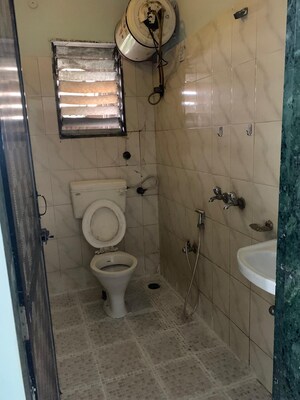 Bathroom in 2 BHK Apartment at New Krishna Tower, Kopar Khairane – for Rent