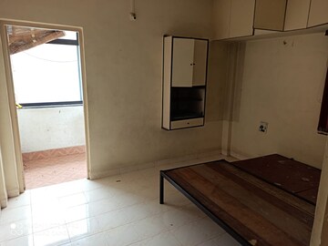 Bedroom in 1 BHK Apartment at Laxmi Krupa Apartments, Bhusari Colony – for Rent