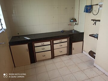 Kitchen in 1 BHK Apartment at Laxmi Krupa Apartments, Bhusari Colony – for Rent