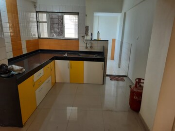 Kitchen in 2 BHK Apartment at Dwarka Lords, Pimple Saudagar – for Sale