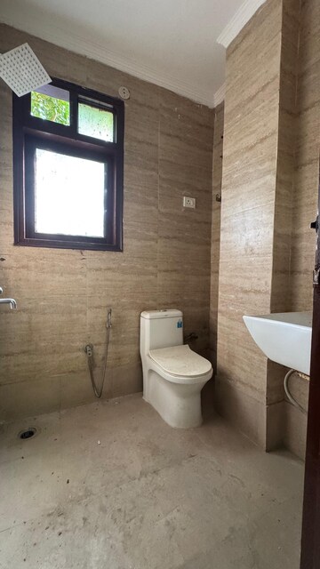 Bathroom in 2 BHK Builder Floor at Chattarpur – for Rent