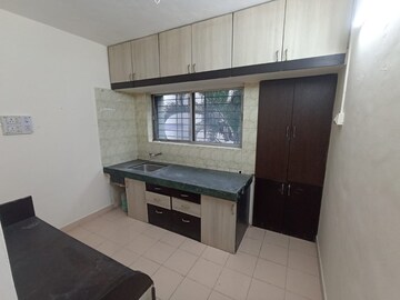 Kitchen in 2 BHK Apartment at Kapare Heights, Anand Nagar – for Rent
