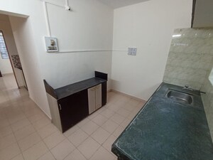 Kitchen in 2 BHK Apartment at Kapare Heights, Anand Nagar – for Rent