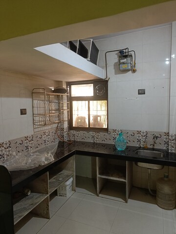 Kitchen in 1 BHK Apartment at Niwara Residency, Seawoods – for Rent
