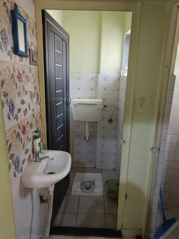 Bathroom in 1 BHK Apartment at Niwara Residency, Seawoods – for Rent